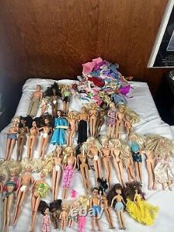 Barbie doll & clothing Lot