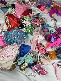 Barbie doll & clothing Lot