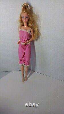 Barbie doll lot 9 Barbies in different out fits Mattel