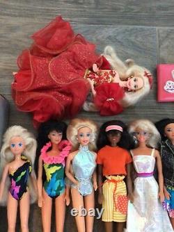 Beautiful Lot of 9 Vintage Barbie Dolls from 70's, 80's and 90's + Pink Wallet