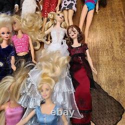 Lot of 20 Barbie Dolls Elivis, Rose, Titanic, Priscilla others