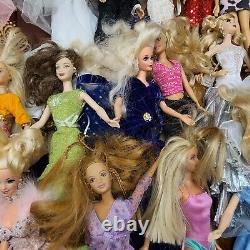 Lot of 20 Barbie Dolls Elivis, Rose, Titanic, Priscilla others
