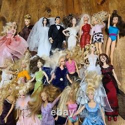 Lot of 20 Barbie Dolls Elivis, Rose, Titanic, Priscilla others