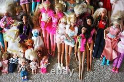 Lot of 35 Loose Mattel Barbie Dolls 1990s with extra Clothes and Accessories