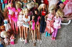 Lot of 35 Loose Mattel Barbie Dolls 1990s with extra Clothes and Accessories