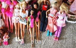 Lot of 35 Loose Mattel Barbie Dolls 1990s with extra Clothes and Accessories