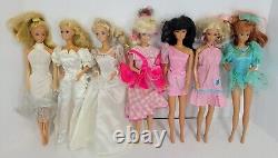 Vintage Lot of 7 1966 Mattel Barbie Dolls with Clothes and Case