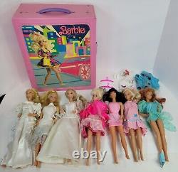 Vintage Lot of 7 1966 Mattel Barbie Dolls with Clothes and Case